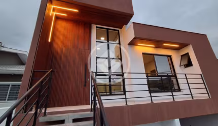 Casa com 3 quartos à venda na José Ilario Ribeiro de Freitas, 1001, Bela Vista, Palhoça, 109 m2 por R$ 650.000