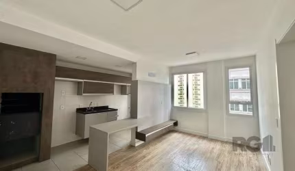 Apartamento para alugar no Bairro Menino Deus com 1 dormitório semi-mobiliado.