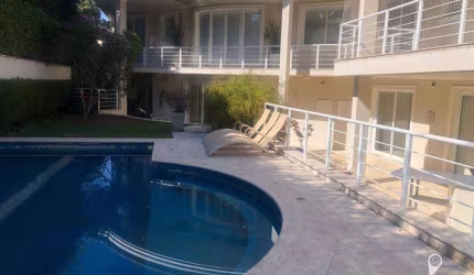 Mansão de Luxo em Alphaville 1 | 950m², 4 Suítes, Elevador, Piscina e Automação Completa