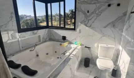 Sobrado com 3 dormitórios à venda, 292 m² por R$ 3.100.000,00 - Condomínio Brisas de Jundiaí - Jundiaí/SP