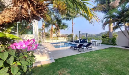 Casa com 4 suítes à venda, 493 m² por R$ 3.300.000 - Golf Village - Carapicuíba/SP