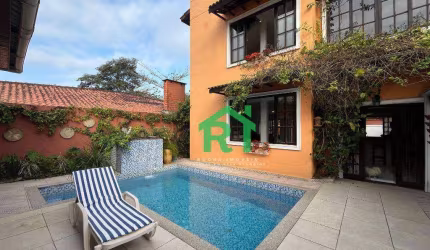 Casa à venda na Praia do Tombo | Rocha Imóveis Guarujá