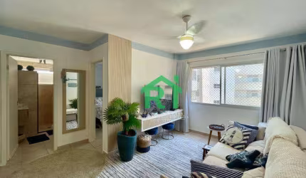 Apartamento à beira mar com 2 dormitórios, 1 vaga, Pitangueiras, Guarujá/SP