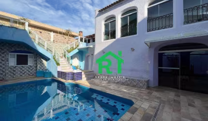 Casa à beira mar com 4 dormitórios (2 suítes), 3 vagas, lazer, Balneário Praia do Pernambuco, Guarujá/SP