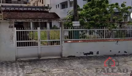 Terreno à venda na Rua Copacabana, 472, Guilhermina, Praia Grande por R$ 1.010.000