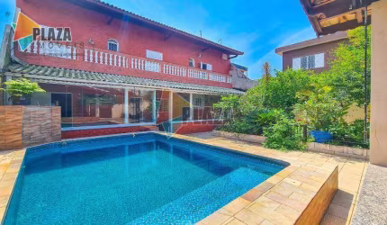 Casa 4 dormitórios com 3 suítes à venda, 310 m² por R$ 1.100.000,00- Nova Mirim - Praia Grande/SP