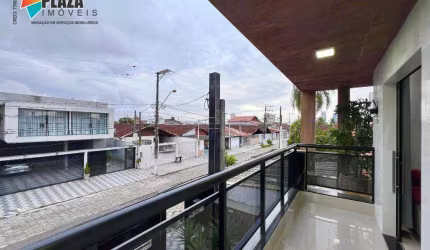 Casa em condomínio para alugar no bairro Maracanã, em Praia Grande/SP.