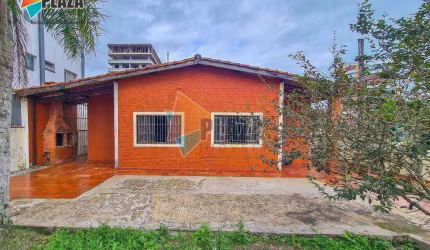 Casa 4 dormitórios à venda, 156 m² por R$ 579.000 - Caiçara - Praia Grande/SP