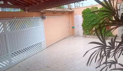 Casa com 3 dormitórios à venda, 100 m² por R$ 900.000,00 - Caiçara - Praia Grande/SP