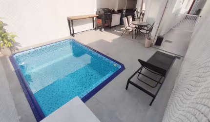 Sobrado com 3 dormitórios à venda, 120 m² por R$ 850.000,00 - Vila Guilhermina - Praia Grande/SP