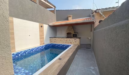 Casa com 2 dormitórios à venda, 112 m² por R$ 720.000,00 - Vila Caiçara - Praia Grande/SP