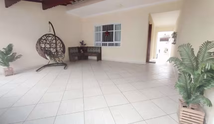 Sobrado com 3 dormitórios à venda, 154 m² por R$ 650.000,00 - Tupi - Praia Grande/SP