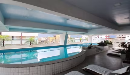 Apartamento com 2 dormitórios à venda, 91 m² por R$ 856.000,00 - Caiçara - Praia Grande/SP
