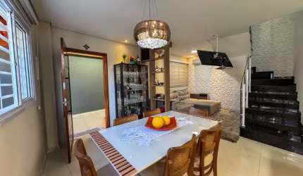 Sobrado com 3 dormitórios à venda, 101 m² por R$ 905.000,00 - Vila Guilhermina - Praia Grande/SP