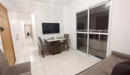 Apartamento com 2 dormitórios para alugar, 64 m² por R$ 3.200,01/mês - Caiçara - Praia Grande/SP