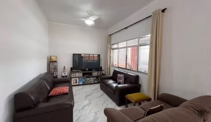 Casa com 3 dormitórios à venda, 165 m² por R$ 565.000,00 - Caiçara - Praia Grande/SP