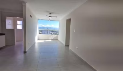 Apartamento com 2 dormitórios para alugar, 71 m² por R$ 3.500,02/mês - Vila Guilhermina - Praia Grande/SP