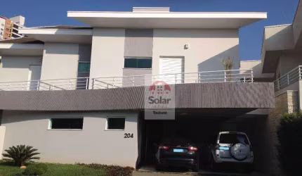 Casa com 3 dormitórios à venda, 310 m² por R$ 1.580.000,00 - Condomínio Village Taubaté - Taubaté/SP