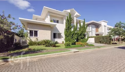 Casa em condomínio fechado com 4 quartos à venda na Rodovia Doutor Antônio Luiz Moura Gonzaga, 3825, Rio Tavares, Florianópolis, 328 m2 por R$ 4.999.000