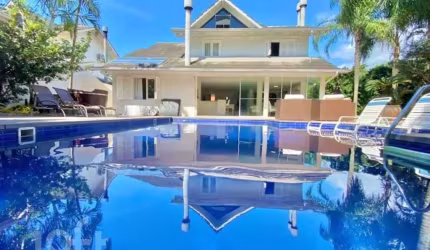 Casa em condomínio fechado com 4 quartos à venda na Rodovia Jornalista Manoel de Menezes, 2057, Barra da Lagoa, Florianópolis, 380 m2 por R$ 3.300.000