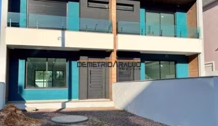 Casa com 3 quartos à venda na Rua Ana Abruzzi, 65, Mário Quintana, Porto Alegre, 125 m2 por R$ 595.000