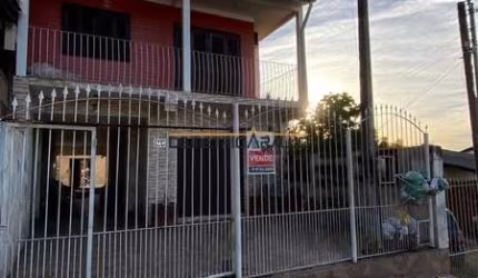 Casa com 3 quartos à venda na Irmã Arsenia Erthal, 149, Jardim Algarve, Alvorada, 110 m2 por R$ 400.000