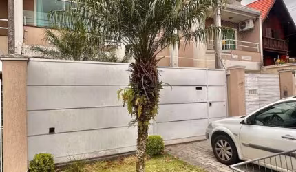 Casa com 3 quartos à venda no Bacacheri, Curitiba  por R$ 1.199.000