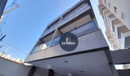 Sobrado em condomínio com 2 dormitórios à venda, 61 m² por R$ 340.000 - Vila Guilhermina - Praia Grande/SP