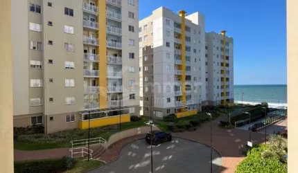 Apartamento pé na areia a venda em Barra Velha, mobiliado