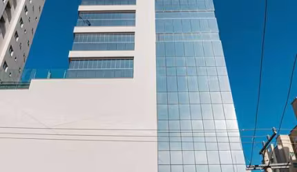 Apartamento com 4 suítes vista mar em Meia Praia Itapema