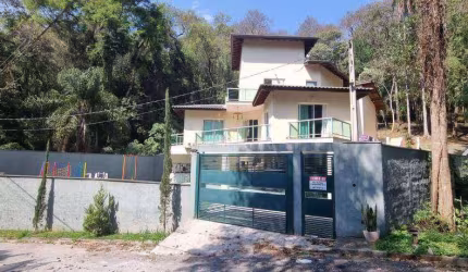 Casa com 4 dormitórios à venda, 418 m² por R$ 1.400.000,00 - Caraguatá - Mairiporã/SP