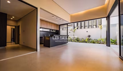 Casa alto padrão no condomínio Alphaville II com três suítes e área gourmet.
