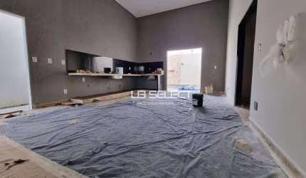Casa alto padrão no bairro Jardim Botânico com três quartos e varanda gourmet completa.