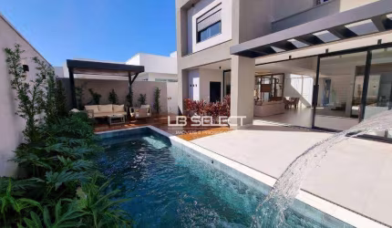 Sobrado alto padrão no condomínio Reserva dos Ipês com três suites, escritório e varanda gourmet completa.