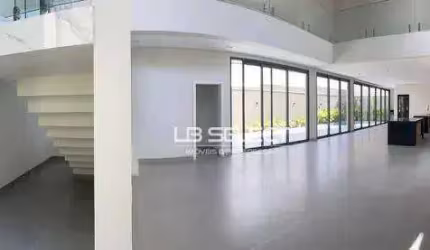 Casa alto padrão no Condomínio Jardins Barcelona com quatro suítes, escritório com lavabo e área gourmet.
