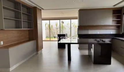 Casa no Condomínio Alphaville I com quatro quartos, três suítes e área gourmet completa.