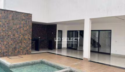Casa no Condomínio Gávea Hill II com quatro suítes e área gourmet completa.