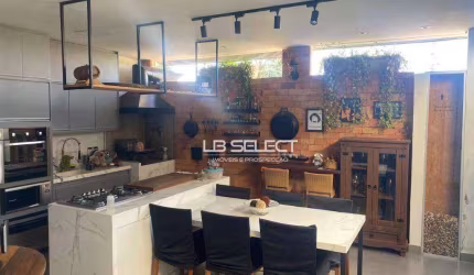 Sobrado no Condomínio Village Unique com três quartos e varanda gourmet.