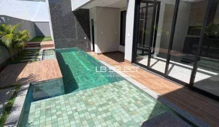 Casa no Condomínio Alphaville I com três suíte e área gourmet completa.
