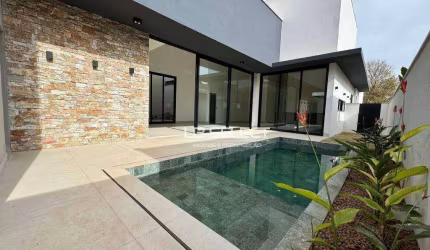 Casa térrea no Condomínio Gávea Paradiso com quatro suítes e área gourmet.