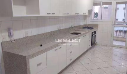 Apartamento no bairro Centro com três quartos, uma suíte e duas vagas de garagem.
