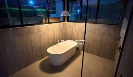 Casa no condomínio Jardim Gênova com quatro suítes, escritório com lavabo e área gourmet completa.