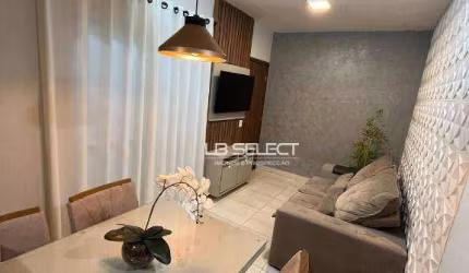 Apartamento no bairro Jardim Espanha com dois quartos, sacada, armários e elevador.