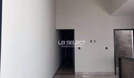 Casa com três quartos, sendo uma suíte, cozinha com área goumet e  garagem para dois carros.