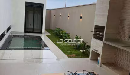Casa no condomínio Raros com três quartos e varanda gourmet.