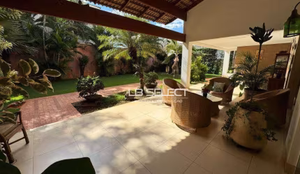 Casa no Condomínio Jardins Barcelona com três quartos, uma suíte com closet, escritório e varanda gourmet ampla.