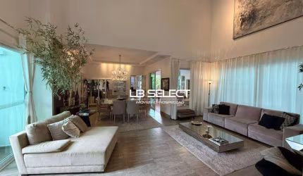 Casa no Condomínio Villa dos Ipês com quatro suítes e área gourmet.