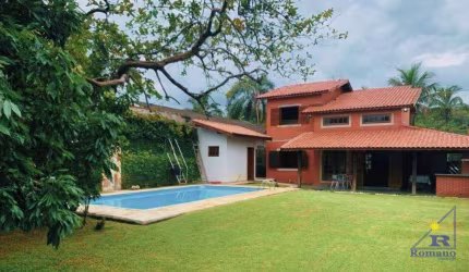Casa em condomínio de frente para praia.