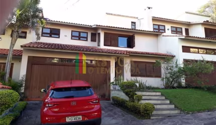 Casa em condomínio fechado com 4 quartos à venda na Praça São Caetano, 90, Teresópolis, Porto Alegre por R$ 1.200.000