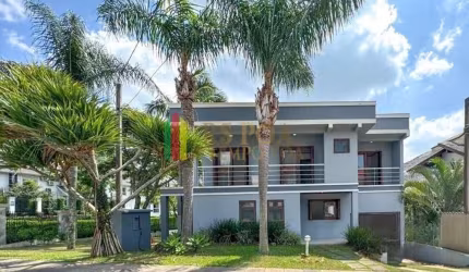 Casa em condomínio fechado com 4 quartos à venda na Rua Tocantins, 937, Lomba do Pinheiro, Porto Alegre por R$ 1.430.000